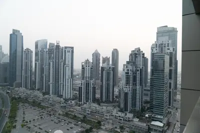a view of a city with tall buildings at Trendy & Cozy Getaway in Dubai