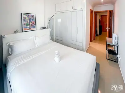 a white bed in a white room with a white bed sidx sidx sidx at DREAM by Design Studio in Dubai