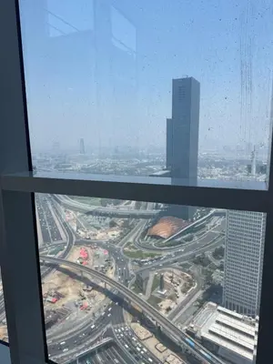 an aerial view of a city from a skyscraper at Affordable master bedroom hotel apartment in Dubai