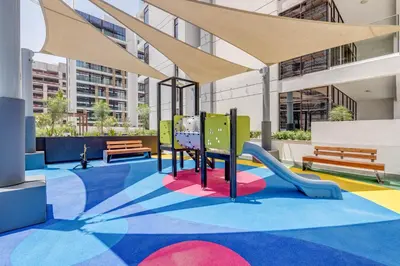 a playground in a building with a slide at GLOBALSTAY Azizi Riviera 59 in Dubai