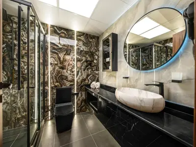 a bathroom with a sink and a mirror at Stylish 1BHK Balcony with Canal View Near Shoba Metro Station in Dubai