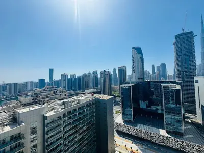 a view of a city skyline with tall buildings at Burj Khalifa Skyline View in Dubai