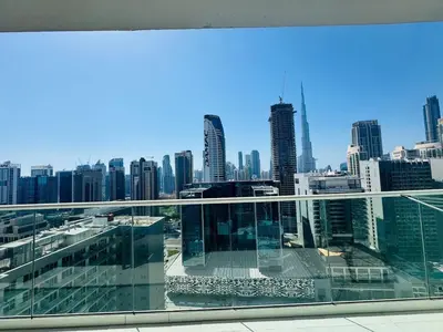 a view of a city skyline from a building at Burj Khalifa Skyline View in Dubai