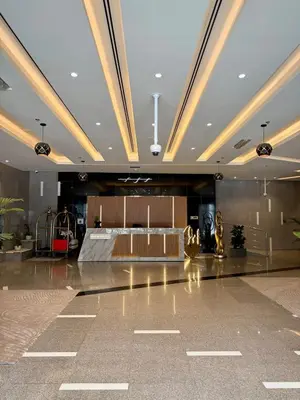 a hotel lobby with a reception desk in the middle at Luxury 1BR studio with Scenic view near Dubai mall in Dubai