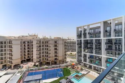an aerial view of a city with tall buildings at Chic Studio in Arjan with Gym Pool Free parking in Dubai