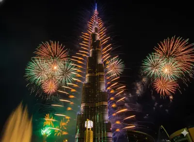 a picture of the burj khalifa with fireworks at Sky-High Burj Khalifa and Fountain Views in Dubai