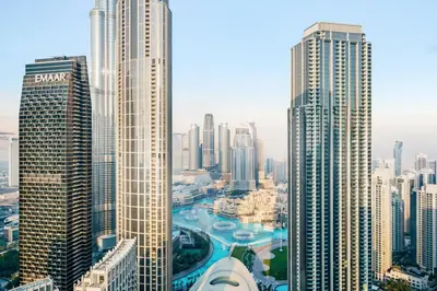 an aerial view of a city with tall buildings at Upgraded 3BR plus Maid's near Burj Khalifa & Dubai Opera in Dubai