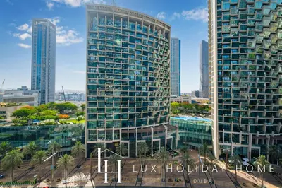 a view of a city with two tall buildings at LUX The Address Opera Downtown Suite in Dubai