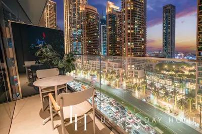 a balcony with a view of a city skyline at LUX The Address Opera Downtown Suite in Dubai
