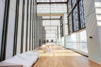 a large room with a bed and a large window at Luxurious Crown - Downtown - Fountains View in Dubai