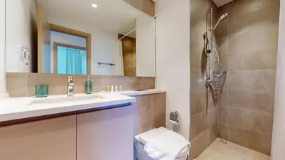a bathroom with a sink and a shower at Creek Gate - Spacious Two Bed in Creek Harbour in Dubai