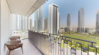 a balcony with a view of the city at Creek Gate - Spacious Two Bed in Creek Harbour in Dubai