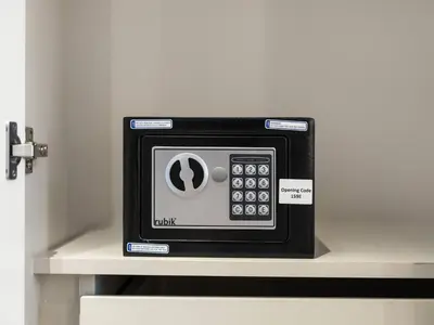 a microwave oven sitting on top of a shelf at NEW Luxury 2 Bed in Belgravia Heights in JVC in Dubai