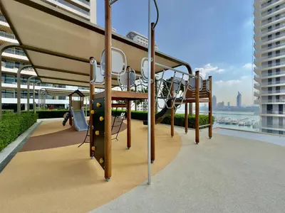 a playground on the top of a building at Elegant and Stylish 1BR, Grand Blue in Dubai