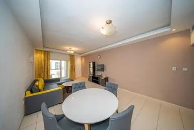 a meeting room with a white table and chairs at City Stay Prime Hotel Apartments - Al Barsha in Dubai
