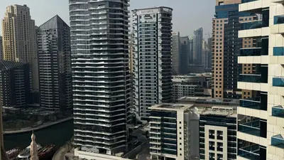 an aerial view of a city with tall buildings at The Manchester JBR Marina Apartment Private Room with shared washroom in Dubai