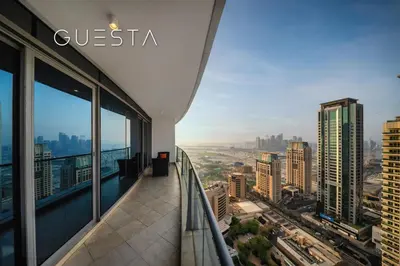 a balcony in a building with a view of a city at Trident Grand Residence 1 BDR plus Guest Bedroom, Dubai Marina in Dubai