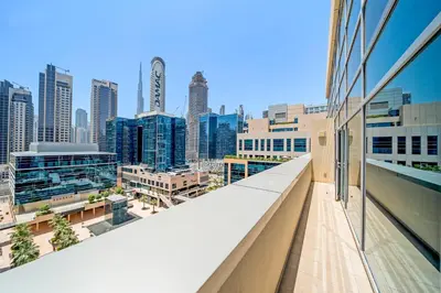 a view of a city skyline from a building at Elegant Studio with Burj Khalifa Skyline Views in Dubai