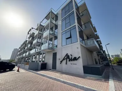 an apartment building with theania written on the side of it at Spacious Designer Home Pool, Gym & Playground in Dubai