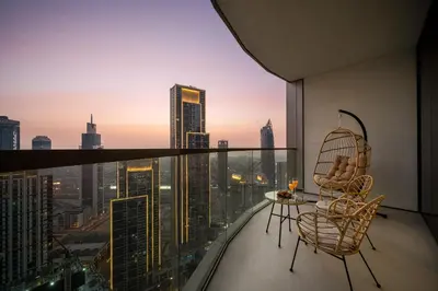 a balcony with a view of a city skyline at Elegant 2BR Apartment near Burj Khalifa, Downtown Dubai in Dubai