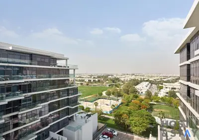 an aerial view of a city from a building at Bright Studio in Loreto DAMAC Hills - Pet-Friendly in Dubai