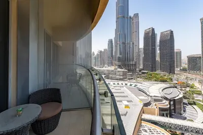 a balcony with a view of a city skyline at Panoramic Burj Khalifa Views - Modern & Comfy Gem in Dubai