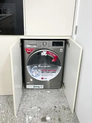 a dishwasher in a kitchen with its door open at Fav 2-Bedroom by The Beach in JBR Bahar with stunning Marina View in Dubai