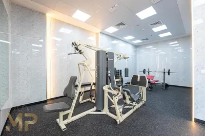 a gym with cardio equipment in a room at Marcopolo -Enjoy Marina views from a cozy 1BR in Dubai Marina in Dubai