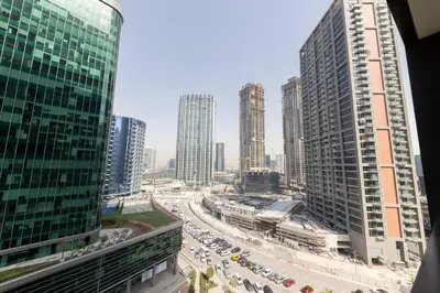 a view of a city with tall buildings and traffic at Ahad Residences Skyline Studio in Business Bay in Dubai