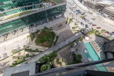 an aerial view of a city with a building at Ahad Residences Skyline Studio in Business Bay in Dubai