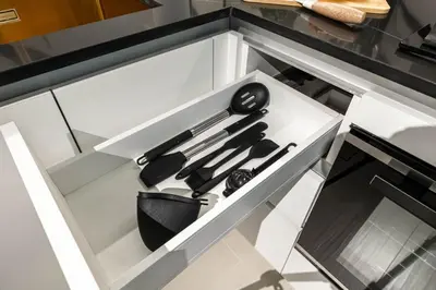 a drawer in a kitchen filled with utensils at New 2BR with Private Jacuzzi in City Centre in Dubai