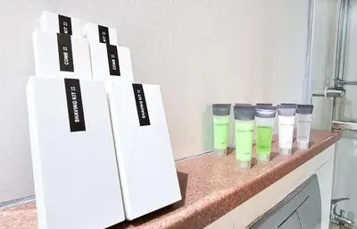 a counter with four cups on a counter top at Cozy 1 Bed aprt in Marina Diamond 1 Tower in Dubai