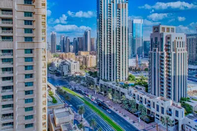 an aerial view of a city with tall buildings at 29 Boulevard Tower 1 Apartment by GLOBALSTAY in Dubai