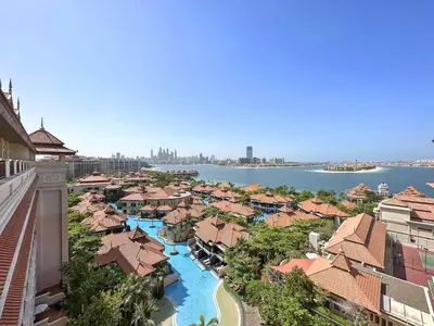 an aerial view of a resort with the water at VayK - Great Escape at Anantara The Palm Residences in Dubai