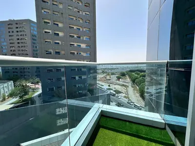 a view from the balcony of a building at Enjoy our feel-home Appartement in Dubai