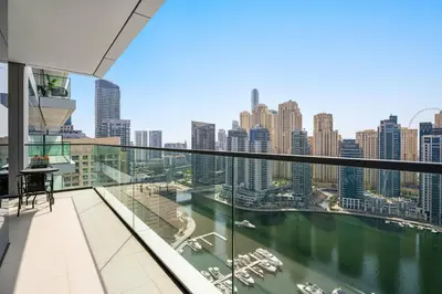 a balcony with a view of the water at VayK - Sleek & Stylish 1BR in Vida Dubai Marina in Dubai