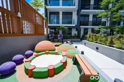 a rendering of a playground in a building at Golden Stays - Brand New JVC Studio I Modern & Fully Furnished in Dubai