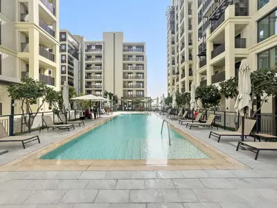 a swimming pool in the middle of a building at VayK - Stunning 1BR with Breathtaking Views in Dubai