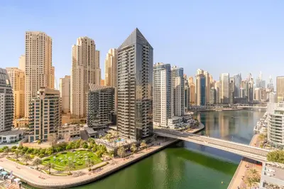 an aerial view of a city with a bridge at VayK - Ocean View 1BR in the Heart of Dubai Marina in Dubai