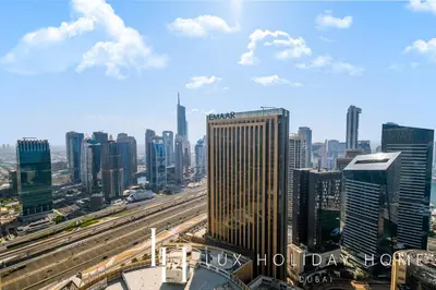 a view of a city with buildings and highways at LUX The JW Marina Suite 3 in Dubai