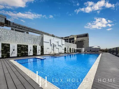 a large swimming pool on top of a building at LUX Dubai Hills Sway Studio 2 in Dubai
