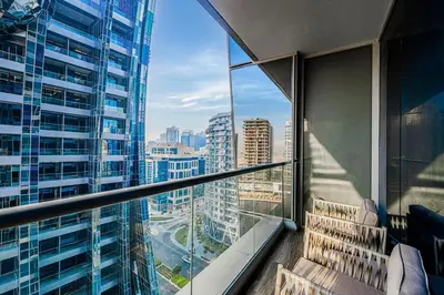 a balcony with a view of a city at Tranquil Haven Near Burj Khalifa in Dubai