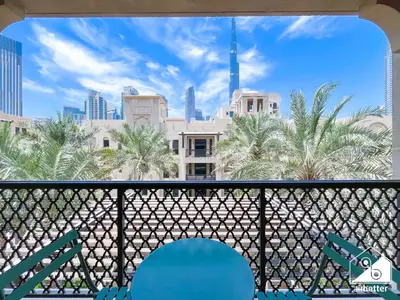 a view of the city from a balcony at Burj Views from Balcony l Chic 2BR in Downtown in Dubai