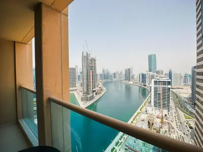 a view of a river from a building at Stylish 1BR Apt with Canal Views in Dubai