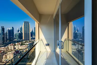 a balcony with a view of the city at SuperHost EMAAR Residences Fashion Avenue - Former Address Dubai Mall Studio's & 1 BR in Dubai