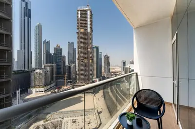 a balcony with a view of a city skyline at Stunning Studio in Burj Al Nujoom in Dubai