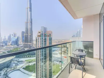 a balcony with a view of the city at TRPS - Act One Act Two Towers, Downtown Dubai, Iconic 3BR plus Maids - with Burj Khalifa Views - Near Dubai Mall in Dubai