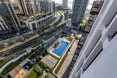 an aerial view of a city street with buildings at Alluring 1BDR apartment in Dubai Creek Harbour in Dubai