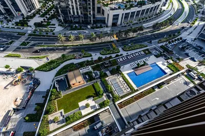 an aerial view of a city with a street at Alluring 1BDR apartment in Dubai Creek Harbour in Dubai