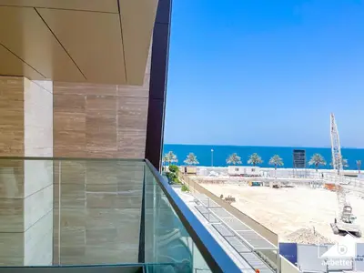 an office building with a view of a construction site at High End 1BR Palm Beachfront Pool Access in Dubai